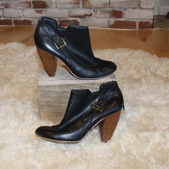 very volatile black booties